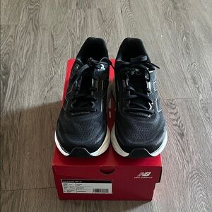 New Balance Men's Black Athletic Shoes with White Accents